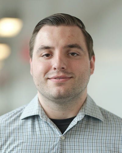 Portrait of Mitchell Moyer, a MD/PhD candidate in Simard and Ksendzovsky labs